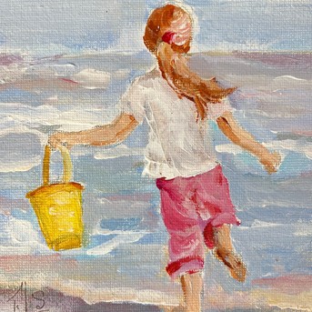 Fillette au seaux jaune
